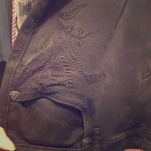 Black stretch jeans with embroidery